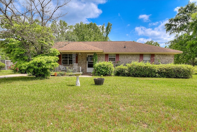 1219 Susan Ct, Waynesboro, GA 30830 - single story home with a porch, a front yard, and brick siding
