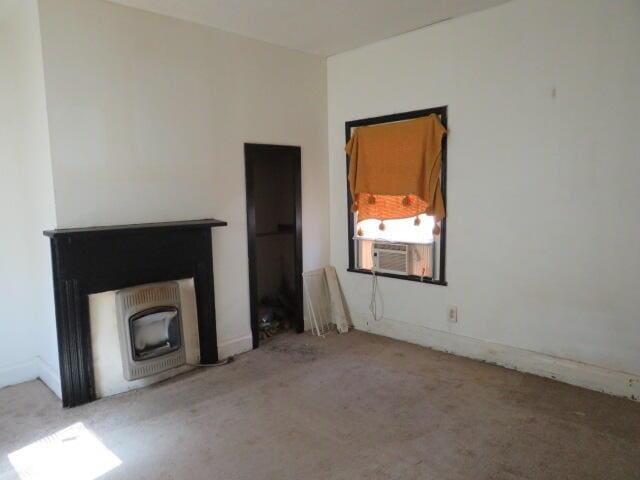 unfurnished living room with cooling unit