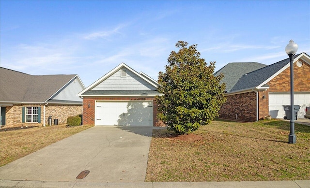 view of front facade with a garage and a front yard