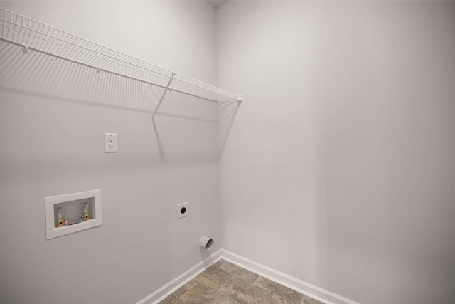 laundry room featuring laundry area, hookup for an electric dryer, baseboards, and washer hookup