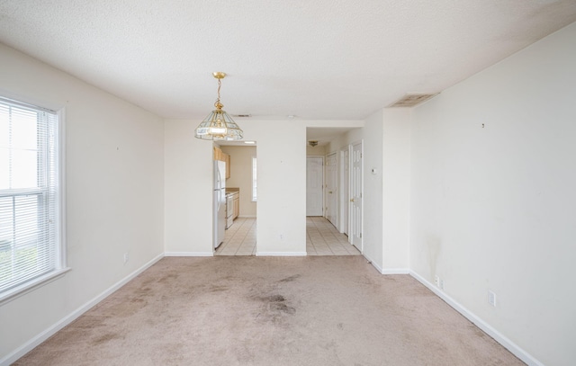 107 Barts Dr, Augusta, GA 30909 - spare room featuring light carpet, healthy amount of natural light, and baseboards