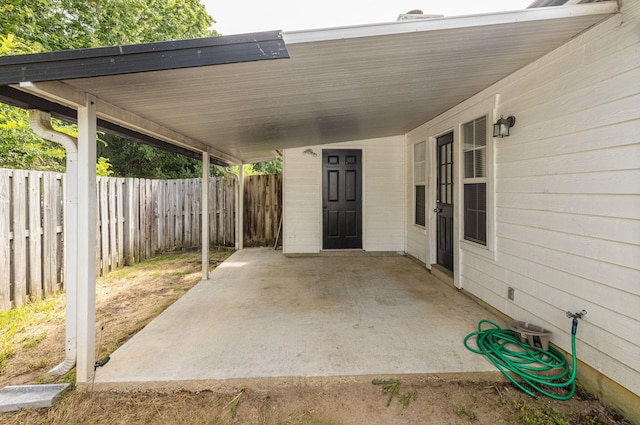 107 Barts Dr, Augusta, GA 30909 - view of patio with a fenced backyard and an attached carport