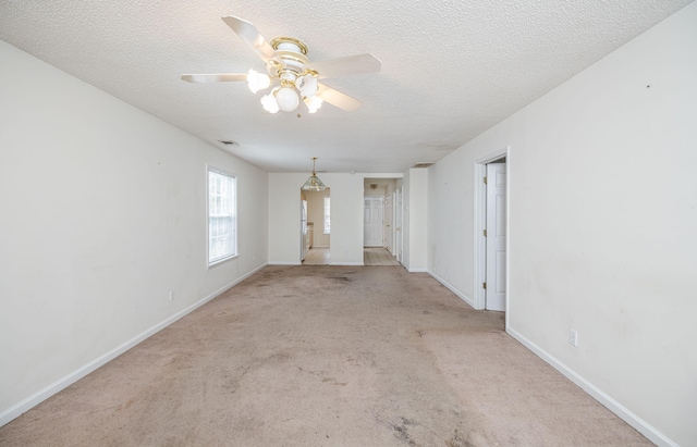 107 Barts Dr, Augusta, GA 30909 - spare room with a ceiling fan, carpet, baseboards, and a textured ceiling