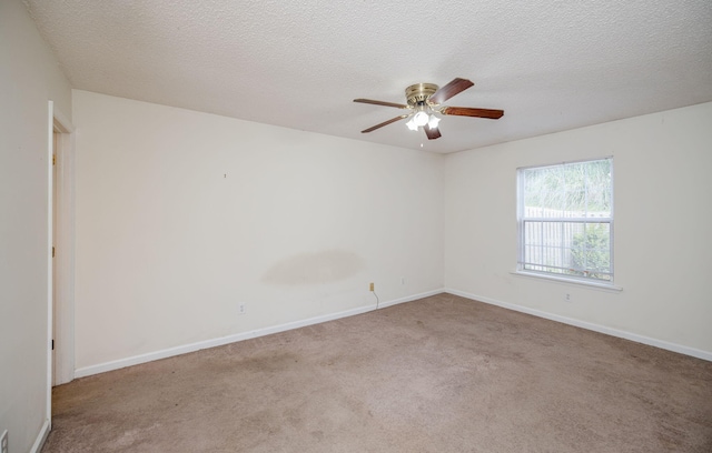 107 Barts Dr, Augusta, GA 30909 - spare room featuring carpet flooring, ceiling fan, baseboards, and a textured ceiling