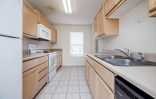 107 Barts Dr, Augusta, GA 30909 - kitchen with white appliances, light brown cabinetry, a sink, a textured ceiling, and light countertops