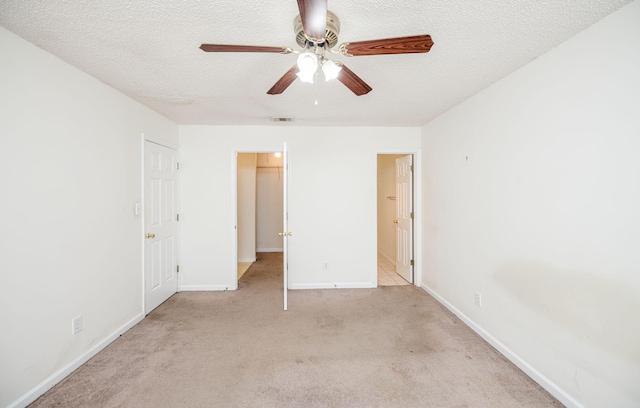 107 Barts Dr, Augusta, GA 30909 - unfurnished bedroom featuring light colored carpet, baseboards, a textured ceiling, ceiling fan, and ensuite bath