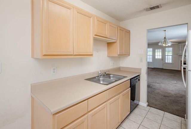 107 Barts Dr, Augusta, GA 30909 - kitchen with a sink, black dishwasher, light brown cabinetry, light carpet, and light countertops