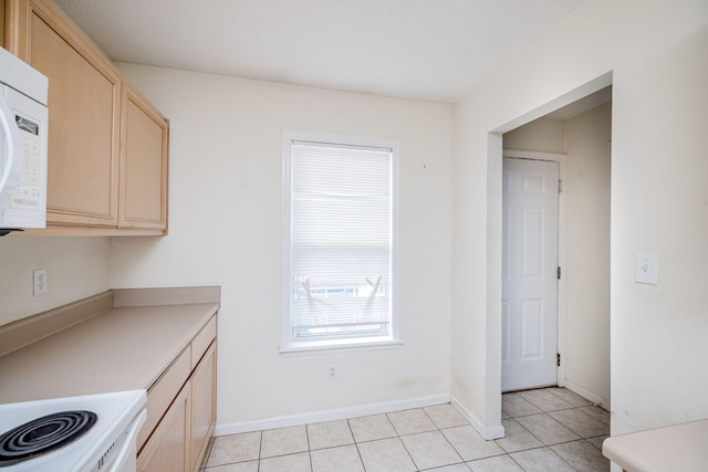 107 Barts Dr, Augusta, GA 30909 - kitchen featuring light brown cabinetry, white appliances, light tile patterned floors, and light countertops