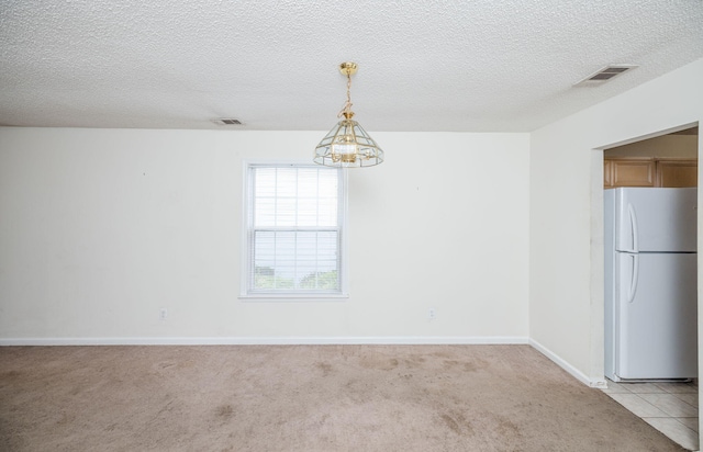 107 Barts Dr, Augusta, GA 30909 - unfurnished dining area with a chandelier, light carpet, baseboards, and a textured ceiling