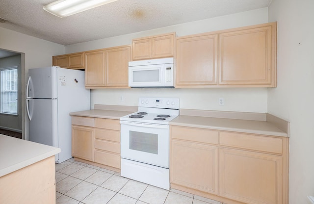107 Barts Dr, Augusta, GA 30909 - kitchen featuring white appliances, light brown cabinetry, light countertops, and a textured ceiling