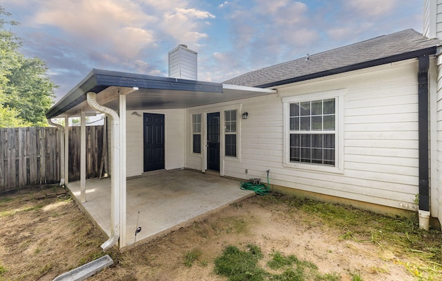 107 Barts Dr, Augusta, GA 30909 - rear view of property with a patio, fence, and a chimney