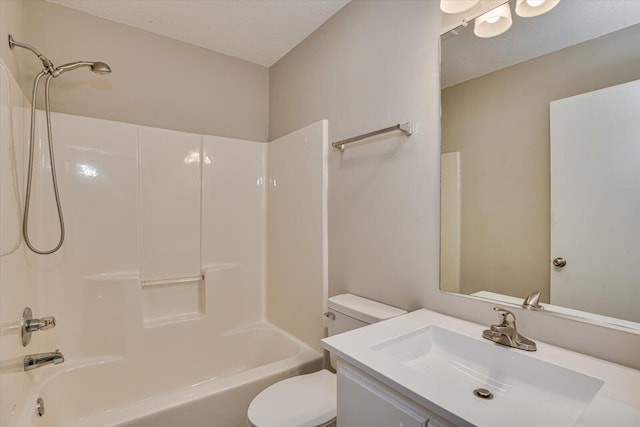 full bathroom featuring a textured ceiling, vanity, toilet, and shower / washtub combination