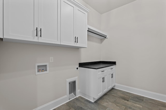 laundry area featuring cabinet space, baseboards, washer hookup, dark wood-style flooring, and hookup for an electric dryer