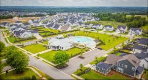 aerial perspective of suburban area with a pool area