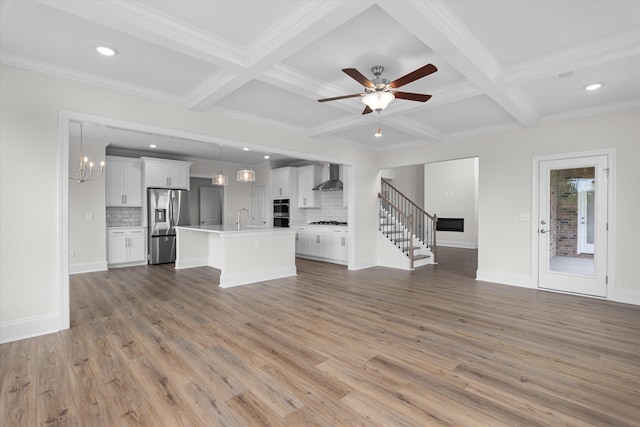 309 Militia Loop, North Augusta, SC 29860 - unfurnished living room with a sink, coffered ceiling, beam ceiling, light wood-style flooring, and recessed lighting