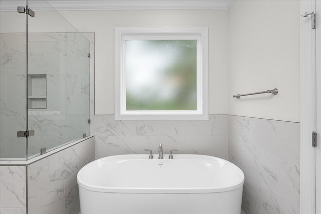 309 Militia Loop, North Augusta, SC 29860 - full bathroom featuring tile walls, a freestanding tub, a marble finish shower, and crown molding