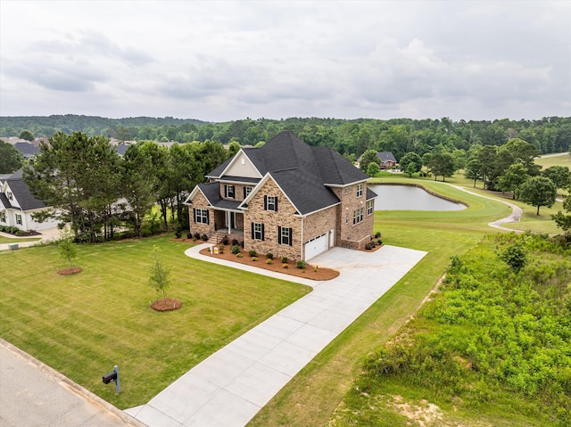 309 Militia Loop, North Augusta, SC 29860 - view of front of property featuring concrete driveway, a water view, a front lawn, stone siding, and brick siding