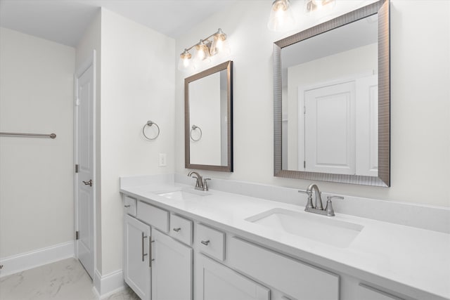 309 Militia Loop, North Augusta, SC 29860 - full bath featuring double vanity, marble look tile flooring, and baseboards