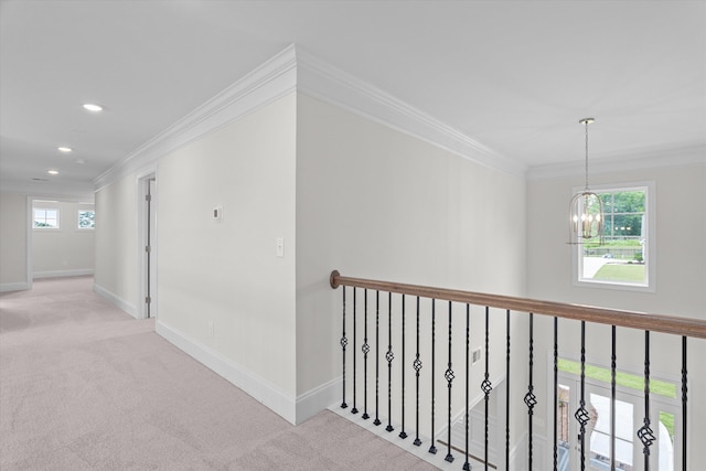 309 Militia Loop, North Augusta, SC 29860 - hallway featuring crown molding, light colored carpet, a chandelier, baseboards, and recessed lighting