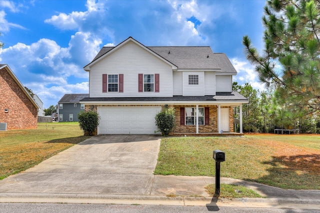 view of front facade featuring a front yard and a garage