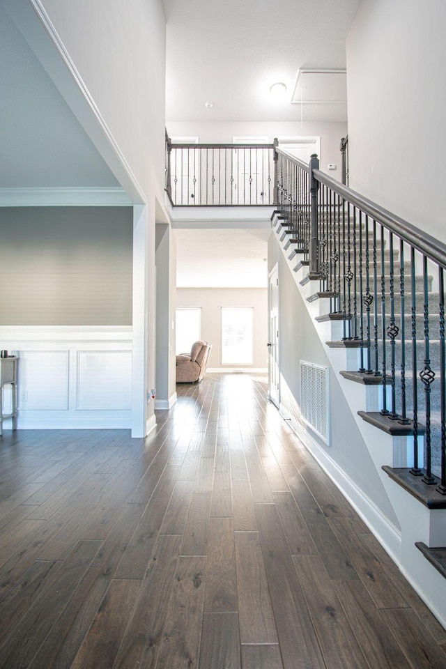 staircase featuring hardwood / wood-style floors