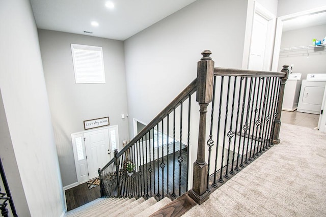 1144 Bubbling Springs Dr, Graniteville, SC 29829 - staircase with visible vents, recessed lighting, a towering ceiling, carpet flooring, and washer and clothes dryer