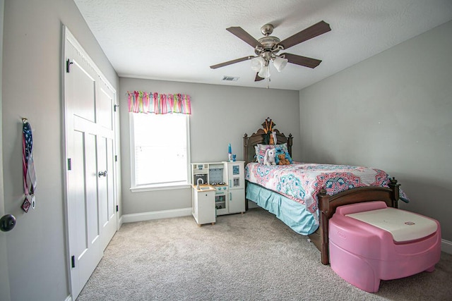 1144 Bubbling Springs Dr, Graniteville, SC 29829 - carpeted bedroom featuring visible vents, baseboards, a textured ceiling, and a ceiling fan