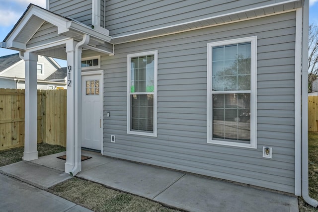 exterior space featuring fence and a patio