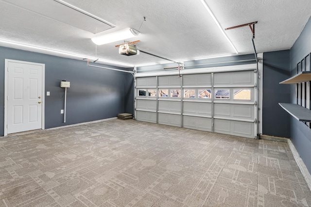 garage with a garage door opener and baseboards