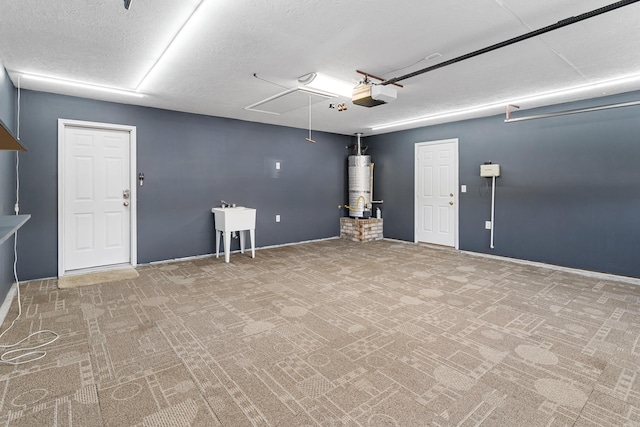 garage with gas water heater and a garage door opener