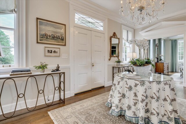 3406 W Richland Ave, Aiken, SC 29801 - entrance foyer with a chandelier, ornamental molding, and wood finished floors