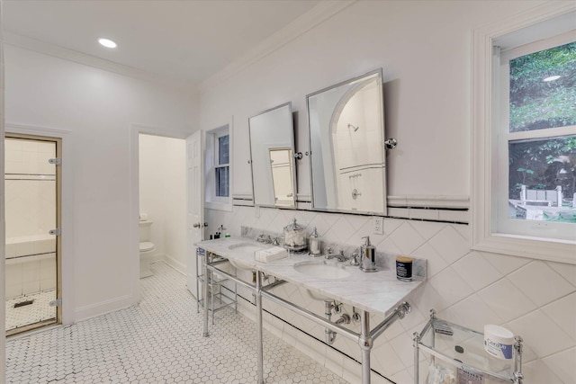 3406 W Richland Ave, Aiken, SC 29801 - bathroom with ornamental molding, double vanity, a stall shower, and tasteful backsplash
