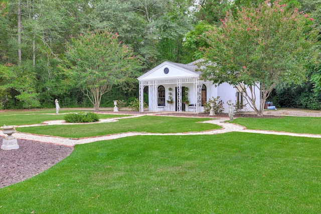 3406 W Richland Ave, Aiken, SC 29801 - neoclassical home with a front lawn and an outbuilding
