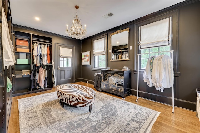 3406 W Richland Ave, Aiken, SC 29801 - living area with a chandelier, wood finished floors, and crown molding