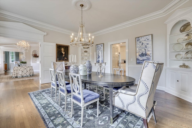 3406 W Richland Ave, Aiken, SC 29801 - dining room featuring a chandelier, built in features, ornamental molding, wood finished floors, and a decorative wall