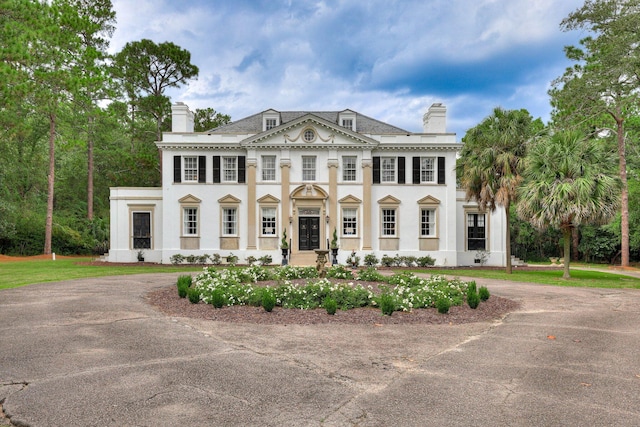 3406 W Richland Ave, Aiken, SC 29801 - view of front facade featuring a chimney, curved driveway, and stucco siding