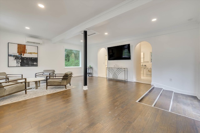 3406 W Richland Ave, Aiken, SC 29801 - living room featuring arched walkways, a wall mounted AC, wood finished floors, ornamental molding, and recessed lighting