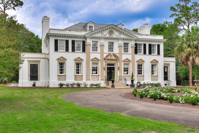 3406 W Richland Ave, Aiken, SC 29801 - view of front facade with a chimney, stucco siding, and a front yard