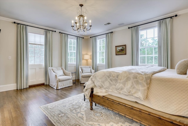 3406 W Richland Ave, Aiken, SC 29801 - bedroom with a chandelier, ornamental molding, and wood finished floors