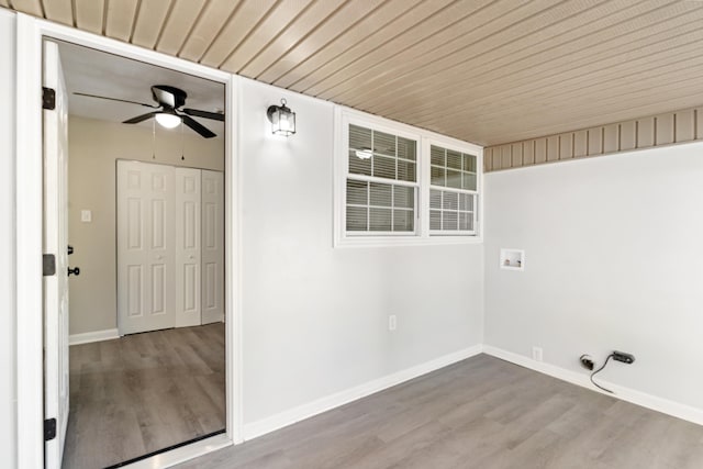 washroom featuring ceiling fan, hookup for a washing machine, wood finished floors, and gas dryer hookup