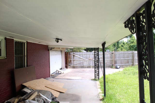 2266 Darlington Dr, Augusta, GA 30904 - view of patio with a garage