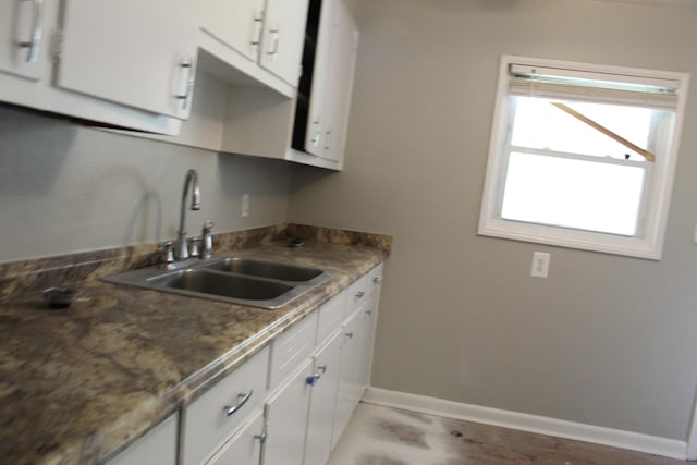 2266 Darlington Dr, Augusta, GA 30904 - kitchen featuring a sink and white cabinetry