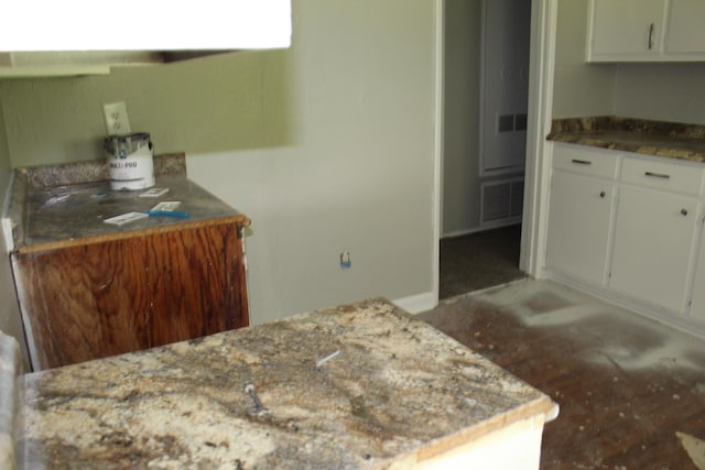 2266 Darlington Dr, Augusta, GA 30904 - kitchen with stone counters and white cabinets
