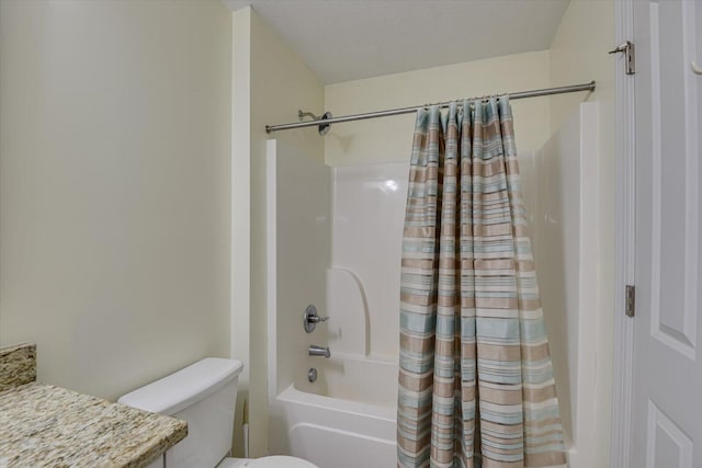 bathroom featuring shower / bath combination with curtain, vanity, and toilet