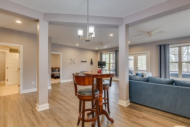 dining space with light wood-style floors, recessed lighting, baseboards, and a ceiling fan