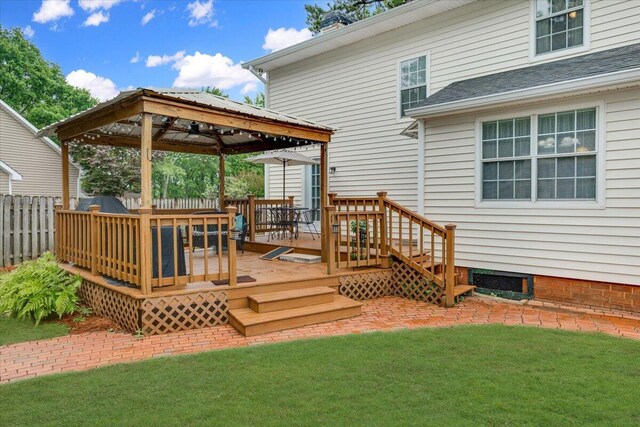 wooden deck with a gazebo