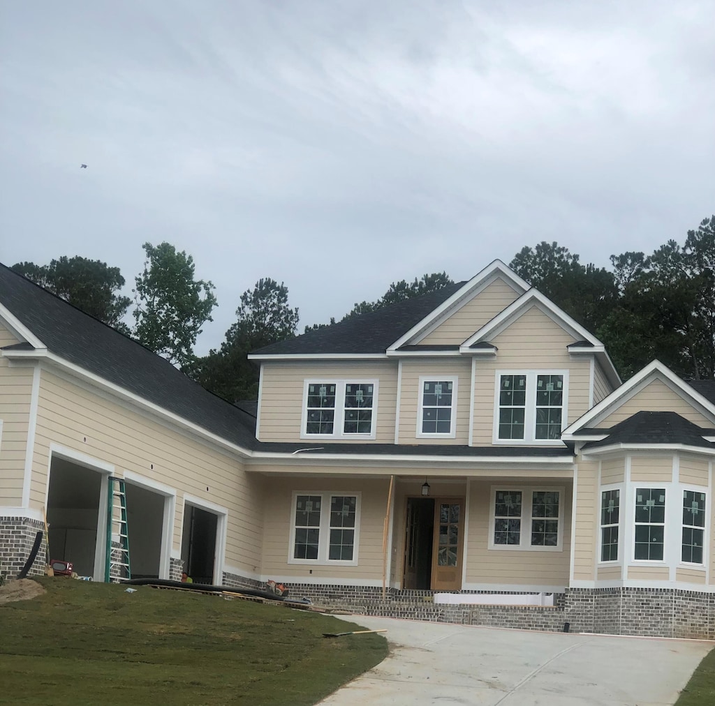 971 Bartram Rdg, Evans, GA 30809 - view of front facade with covered porch and concrete driveway