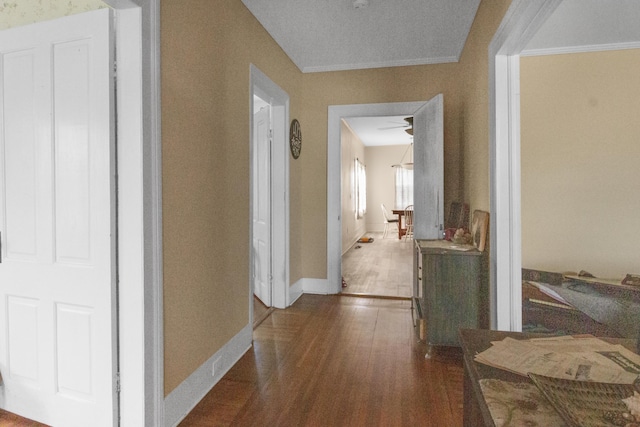 208 W W Hall St, Thomson, GA 30824 - hallway featuring wood finished floors and crown molding
