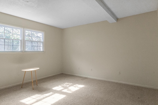 208 W W Hall St, Thomson, GA 30824 - empty room with carpet and beamed ceiling