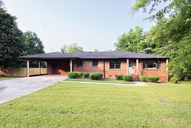 115 W St, Thomson, GA 30824 - single story home with brick siding, a carport, and concrete driveway